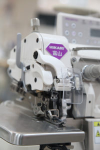 máy vắt sổ điện tử hút hơi hikari